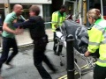 Psmith-05-Tariq clashes with police as body wheeled out.JPG